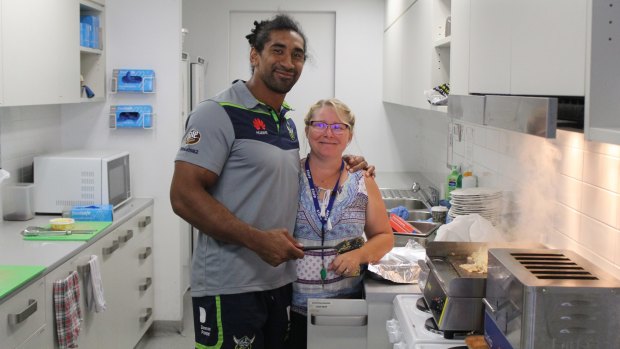 Sia Soliola cooking up a storm in the UnitingCare kitchen.
