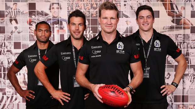 Collingwood coach Nathan Buckley with new recruits Travis Varcoe, Levi Greenwood and Jack Crisp.