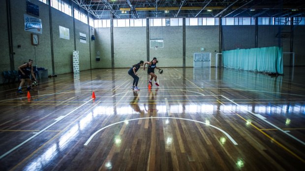 Canberra Capitals Natalie Hurst, Jordan Hooper and Chevannah Paalvast training for their last WNBL game of the season.