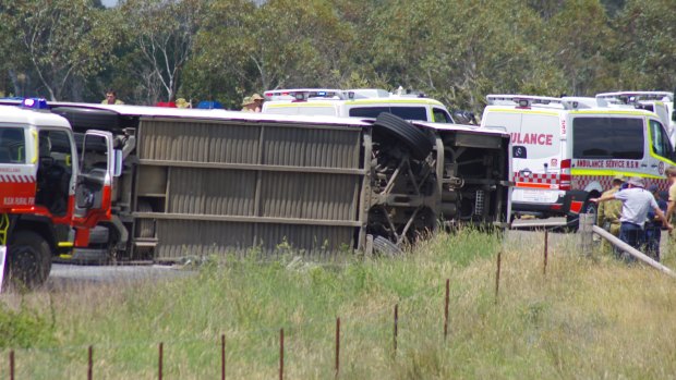 Twelve people have been hospitalised after a bus carrying Australian Defence Force Academy personnel rolled over near Windellama east of Goulburn. 