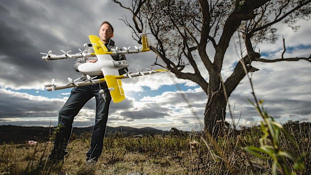 Project Wing co-leader James Ryan Burgess with the delivery drone.