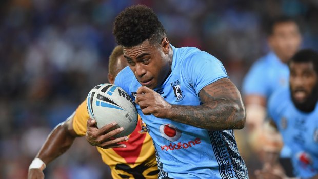 Kevin Naiqama of Fiji makes a break during the International Test Match between Fiji and Papua New Guinea on the Gold Coast.