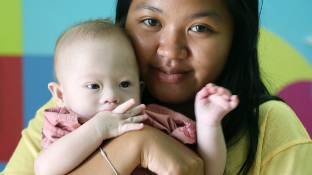 Thai surrogate mother Pattharamon Janbua with baby Gammy.