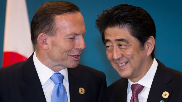 Japan's Prime Minister Shinzo Abe, pictured chatting to Prime Minister Tony Abbott at G20, will leave Brisbane today.