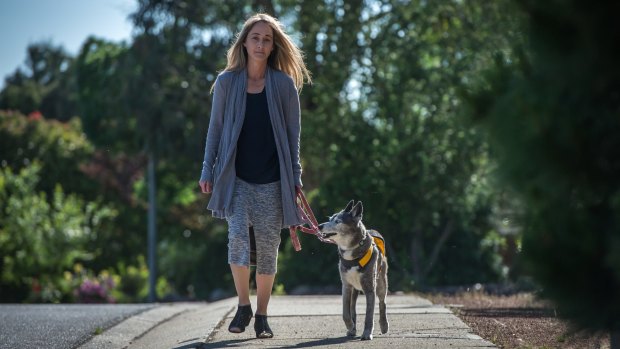 Stirling dog-attack victim Livia Auer says she believes the dog owners claimed diplomatic immunity. She is taking legal action.