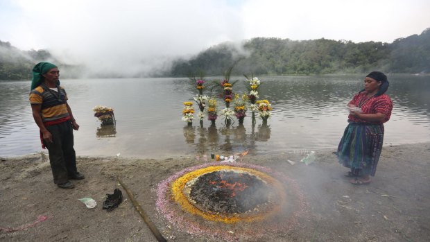 Priests and ceremonies at the shore of the lake contribute to an otherworldly feel.