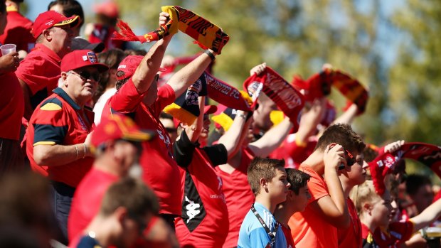 Red or dead: Home fans show support at Coopers Stadium.