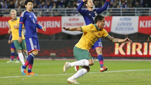 Tim Cahill celebrates after scoring a consolation goal late in the game.