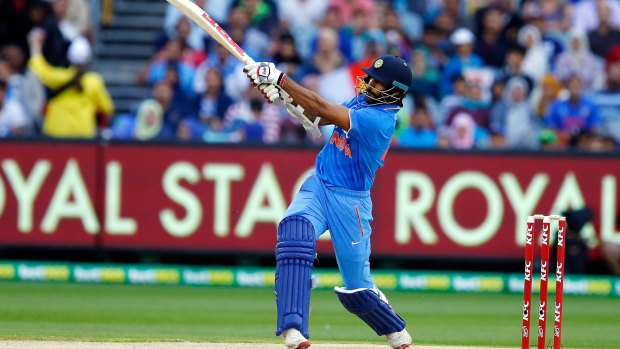 In the swing: India's Shikhar Dhawan scored freely.