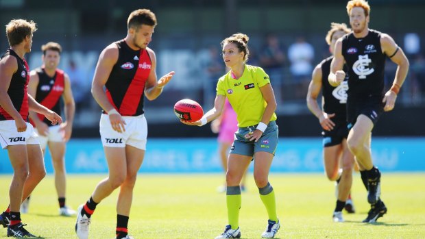 No boundaries:  Eleni Glouftsis becomes the first female field umpire to adjudicate an official AFL match.