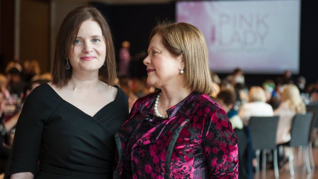 Caitlin Moorhouse, who has bowel cancer, with her mother and CEO of Breast Cancer Network Australia, Christine Nolan, at the Pink Lady luncheon at the National Gallery on Wednesday.