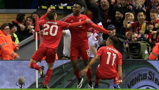 Liverpool's Daniel Sturridge (centre) celebrates after scoring his side's second goal.