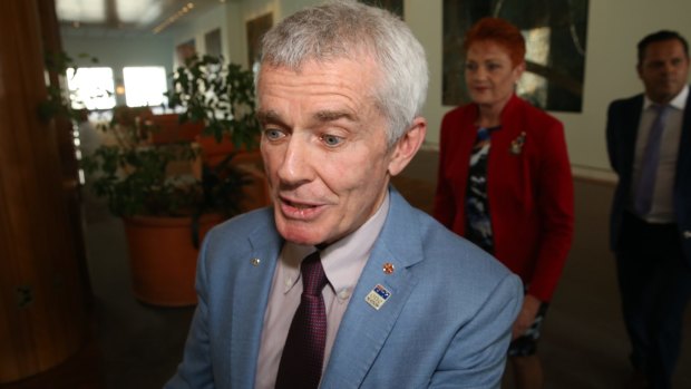 Malcolm Roberts with Pauline Hanson at Parliament House in Canberra on Friday after the High Court booted him from the Senate.