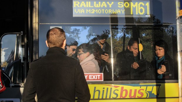 Passengers board at Baulkham Hills.
