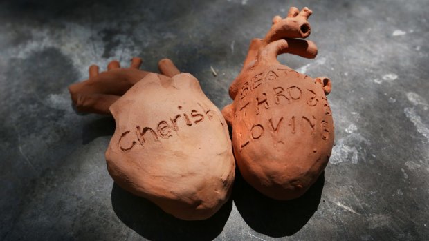 The ceramic hearts were made by refugees, and people from religious and social groups.