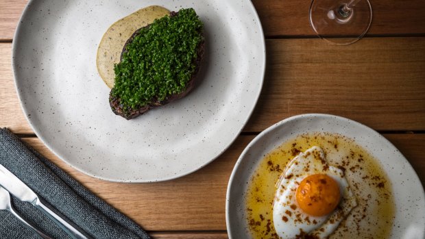 Steak with chives and a fried duck egg. No punches pulled.