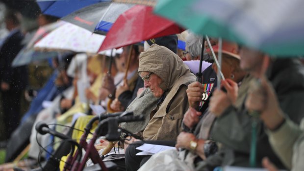Punters came prepared for the wet weather during the visit of Prince Charles and his wife Camilla the Duchess of Cornwall to the Australian War Memorial in Canberra for the  Remembrance Day ceremony.