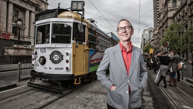 Artist Jon Campbell, seen in 2013 with one of his designs for an art tram.
