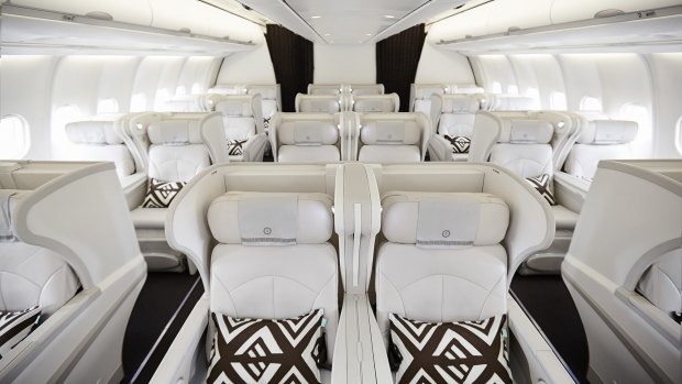 In business class there are leather angled lie-flat seats in a 2-2-2 configuration.