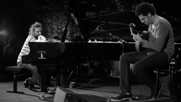 Stefano Bollani (left) and Hamilton de Holanda hit the high notes in a complementary turn.