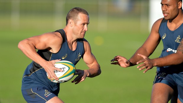 On the move: Matt Giteau goes through his paces at Wallabies training on the Sunshine Coast.
