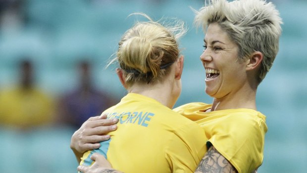 Michelle Heyman, right, celebrates her goal with Clare Polkinghorne during the Rio 2016 group F match between Australia and Zimbabwe at the Fonte Nova Arena in Salvador, Brazil, on Tuesday.
