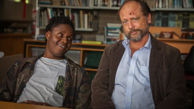 Delinquent basketball champion Tyrell (Thuso Lekwape, left) and cranky teacher Nick Cutler (Alan Dukes) in a scene from Book Week. 