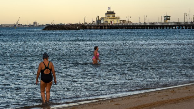 Cooling down at St Kilda beach after another hot Melbourne night.