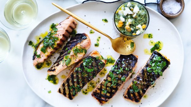 Grilled salmon fillets with salsa verde. 