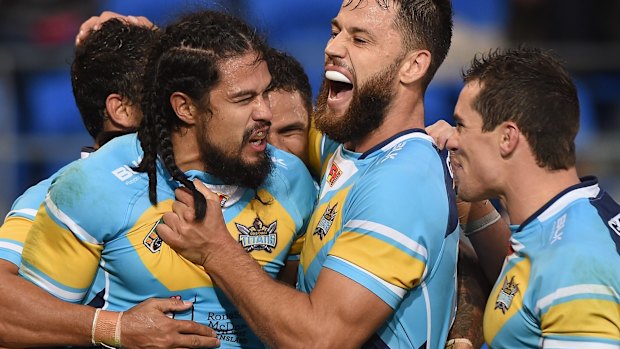 Titanic effort: Kevin Gordon celebrates a try during the Titans' win over the Bulldogs.