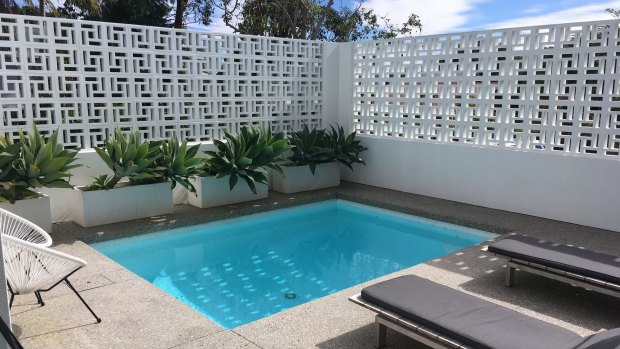 Breeze blocks are back in fashion and the pool here has them.