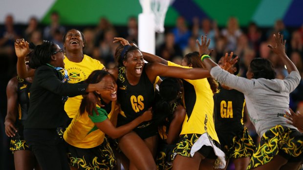 The Jamaican team celebrates victory.