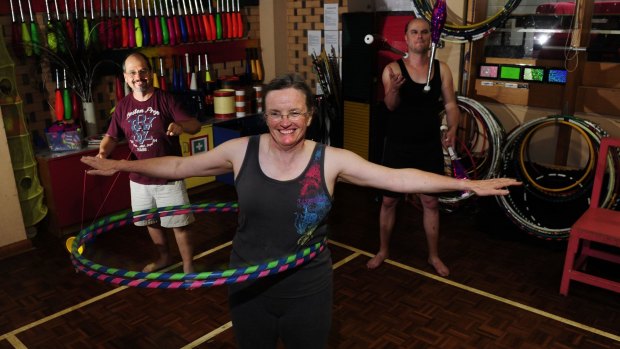 From left, John Lloyd, of Aranda, Mary Kershaw, of Fraser, and Sara Robinson, of Holder, at a Warehouse Circus adult class in Chifley.