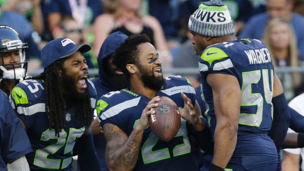 Tough to beat: Richard Sherman, Earl Thomas and Bobby Wagner are part of arguably the best defence in the league.