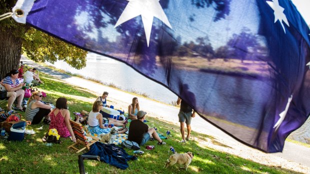 People relaxing around the banks of the Yarra River celebrating Australia Day in 2014