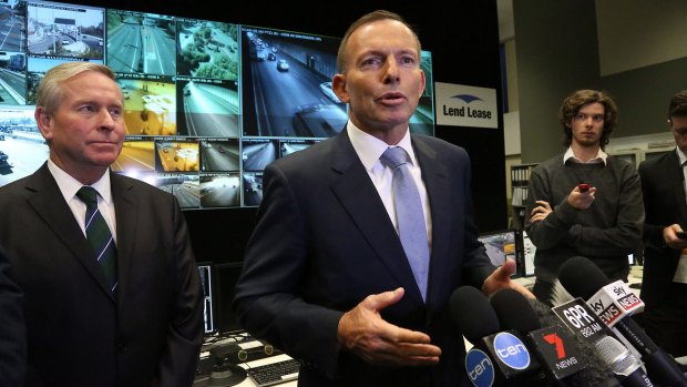 Colin Barnett smirks as Tony Abbott announces he will give the WA government a massive one-off payment.