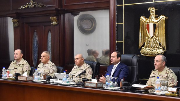 Egyptian President Abdel Fattah al-Sisi, second right, chairs a meeting of the Supreme Council of the Egyptian Armed Forces in Cairo last year.