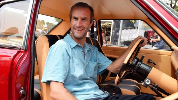 Todd Bulkeley, 38, of Lithgow, has had a passion for Japanese sports sedans since before the accident that left him a paraplegic 19 years ago. He has fitted hand controls to his Datsun 1600 SS coupe so he can drag race it next year. 