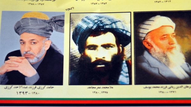 A calendar with pictures of Afghan leaders including Mullah Mohammad Omar, centre. 