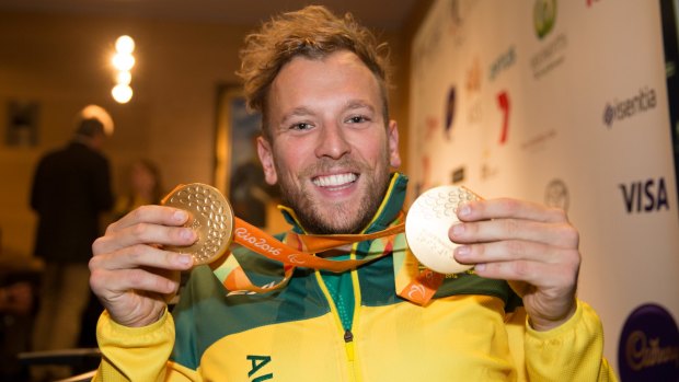 Paralympian Dylan Alcott with his Rio tennis gold medal.
