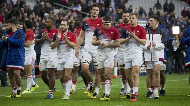 France's players celebrate after winning the Six Nations opener against Italy at Stade de France on Saturday.