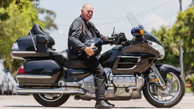 David Williams, 69, is secretary of the Sydney chapter of the Ulysses Club, Inc. shown with his motorbike. 
