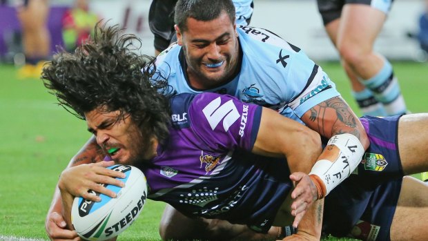 Tohu Harris, seen here scoring against the Cronulla Sharks, says he still works to please coach Craig Bellamy and play the role which best suits the needs of the team.