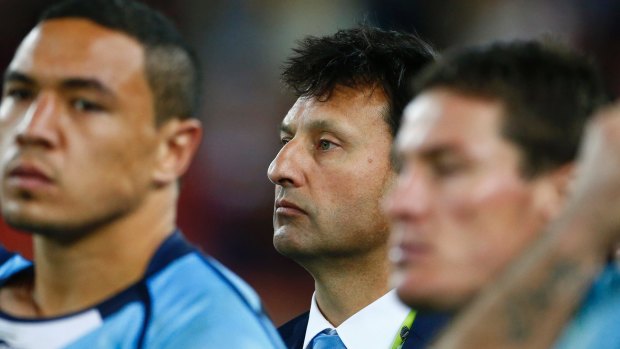 Tough finish: Laurie Daley and the Blues come to terms with another Origin series defeat last year.