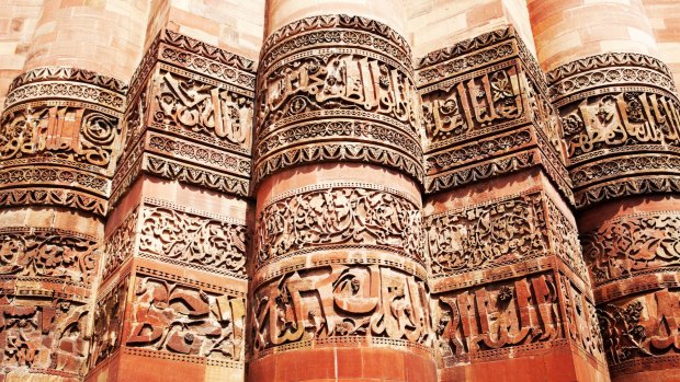 Detail of Qutub (Qutb) Minar, the tallest free-standing stone tower in the world, and the tallest minaret in India, constructed with red sandstone and marble.