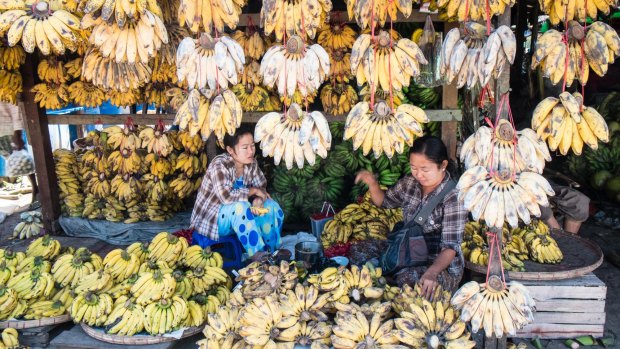 Bananas at a fruit and vegetable market alongside the Yangon's circular rail tracks.