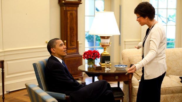Former US president Barack Obama talks with his then senior adviser Valerie Jarrett who was passionate about improving the plight of women and girls during her time in the Oval Office.