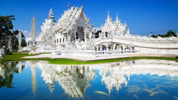 Wat Rong Khun, AKA the White Temple, is stunning and bizarre.