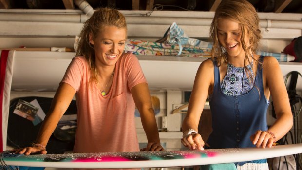 Nancy (Blake Lively) with her sister Chloe (Sedona Legge) in <i>The Shallows</i>.