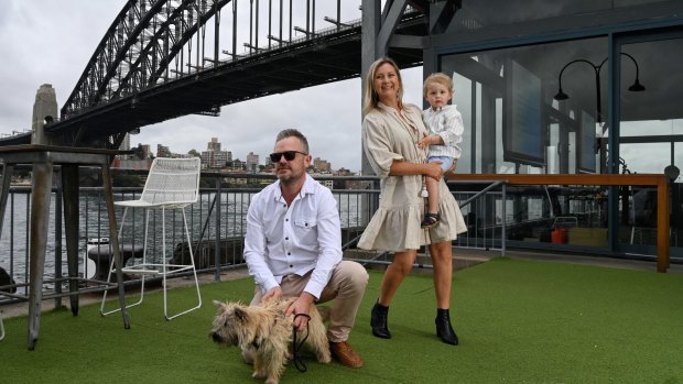 Dan and Amalie Knox with their son Darcy and terrier Scout at Pier One.